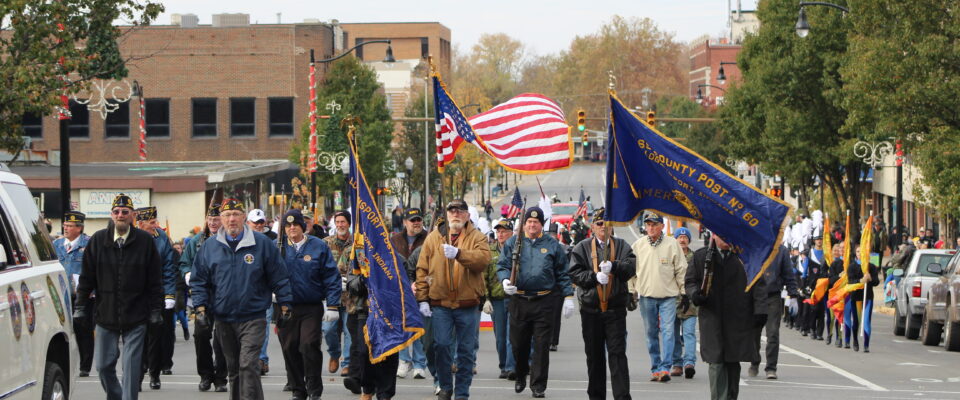 Veterans with Flags in Parade