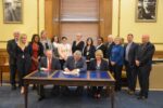 Thumbnail for the post titled: Head joins Holcomb for bill signings