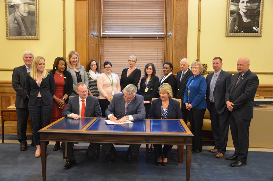 Thumbnail for the post titled: Head joins Holcomb for bill signings