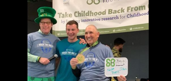 Three men smiling at fundraiser