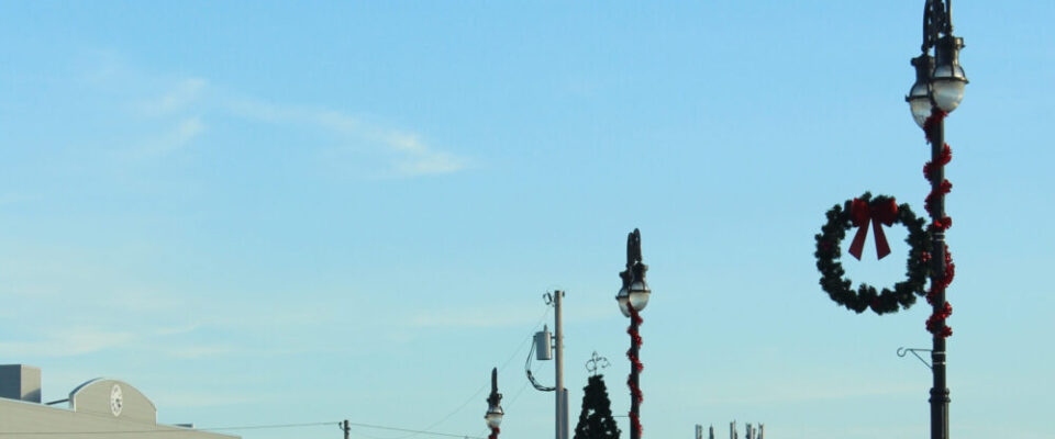 Buildings and light poles with Christmas decorations